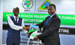 The Outgoing Chairman of the African Roads Maintenance Funds Association (ARMFA)- East Africa Focal Group Mr. Eliud Nyauhenga  (R) from Roads Fund Tanzania handing over the Chairmanship to Dr. Eng. Andrew Naimanye from Roads Fund Uganda at a meeting held in Dar es Salaam, Tanzania.